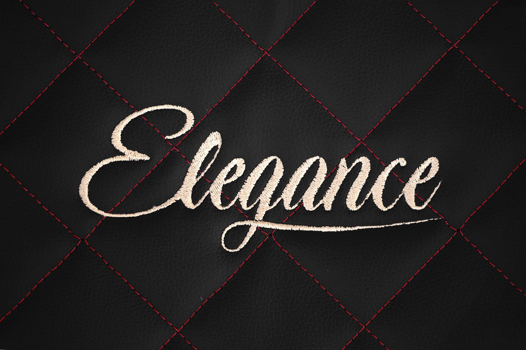 Detail der Elegance-Stickerei: Schwarz-Rot